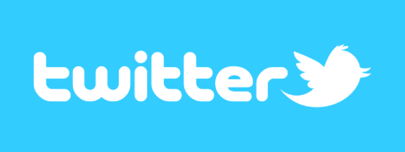 A blue twitter logo with a white bird
